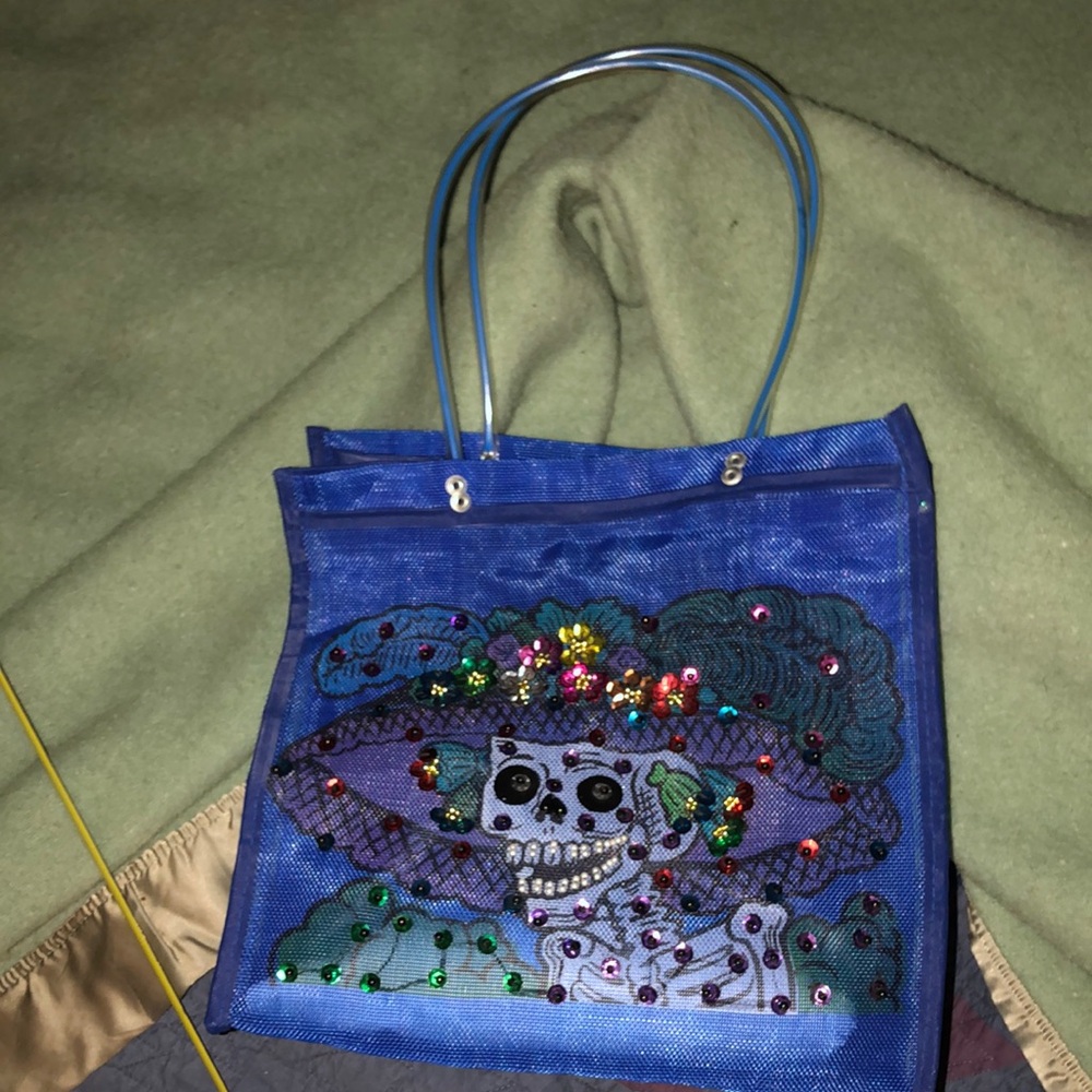 Bought at Boutique unsure brand approx 11x11x6 inches used a few times-unique